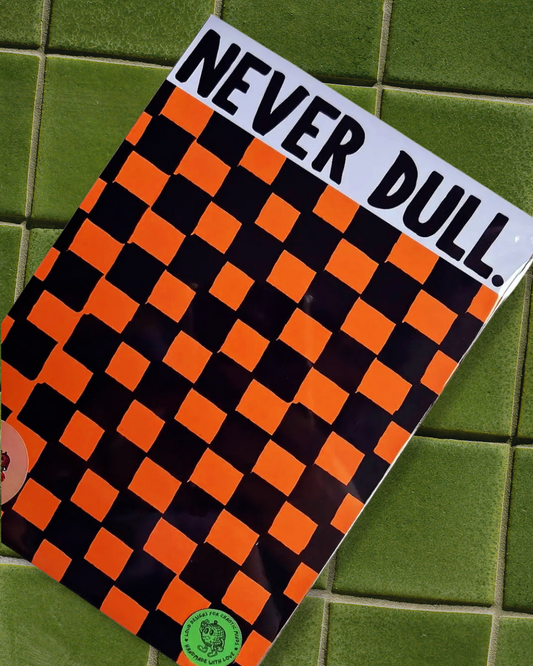 Never Dull Orange and Black Checkerboard Hull Print